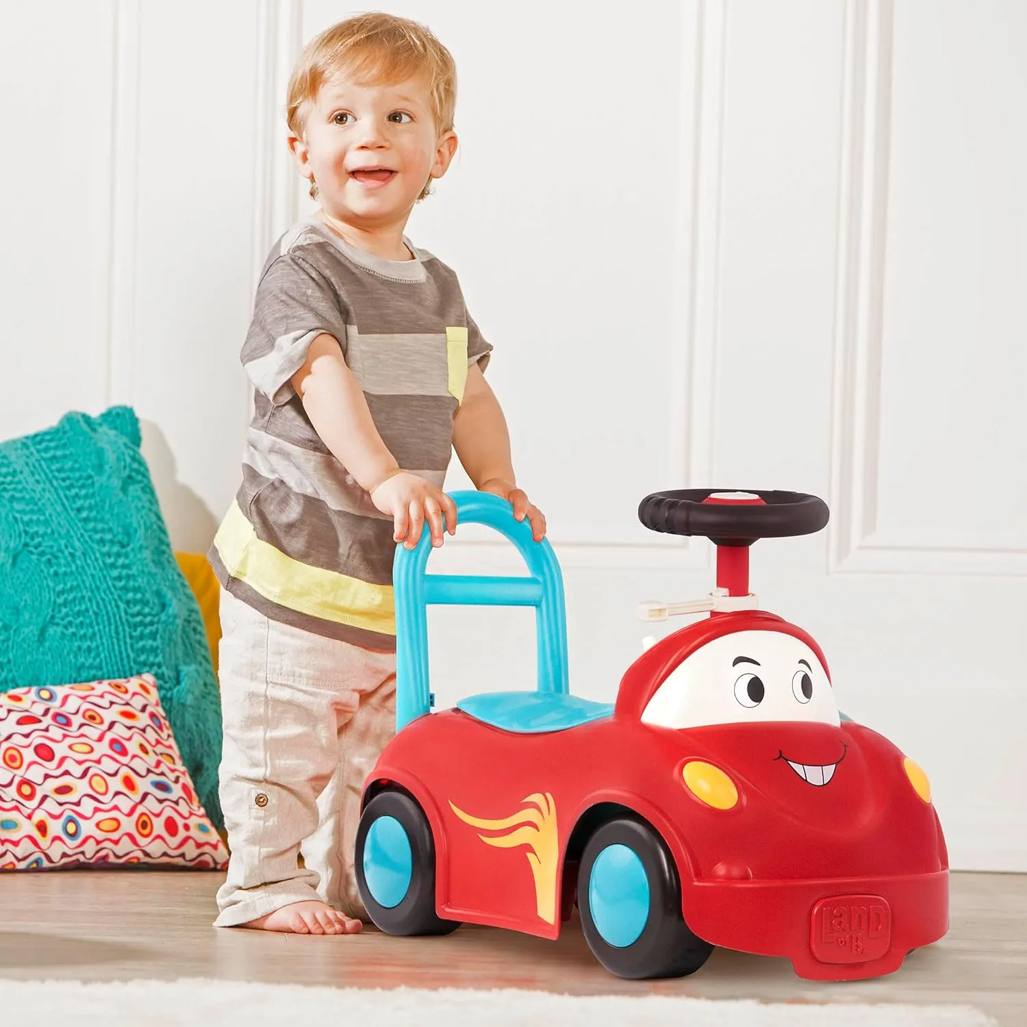 B. toys – Push CarToy – Ride-On Race Car –Walker Toy - Handle & Storage Space – Lights, Songs & Sounds – 1 Year   – Rollin' Riders - Freddy Zoom