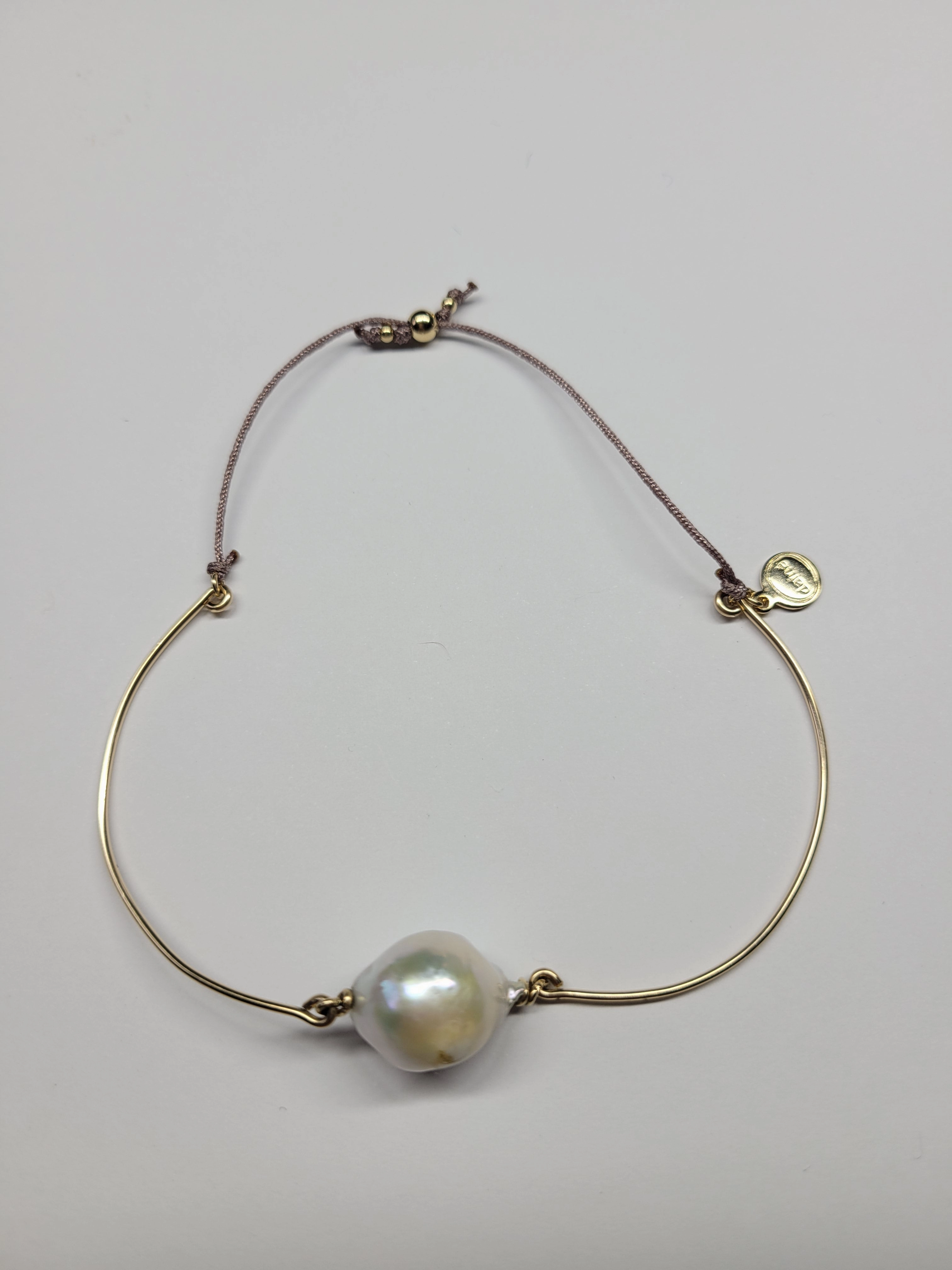 Baroque pearl bangle sliding ball