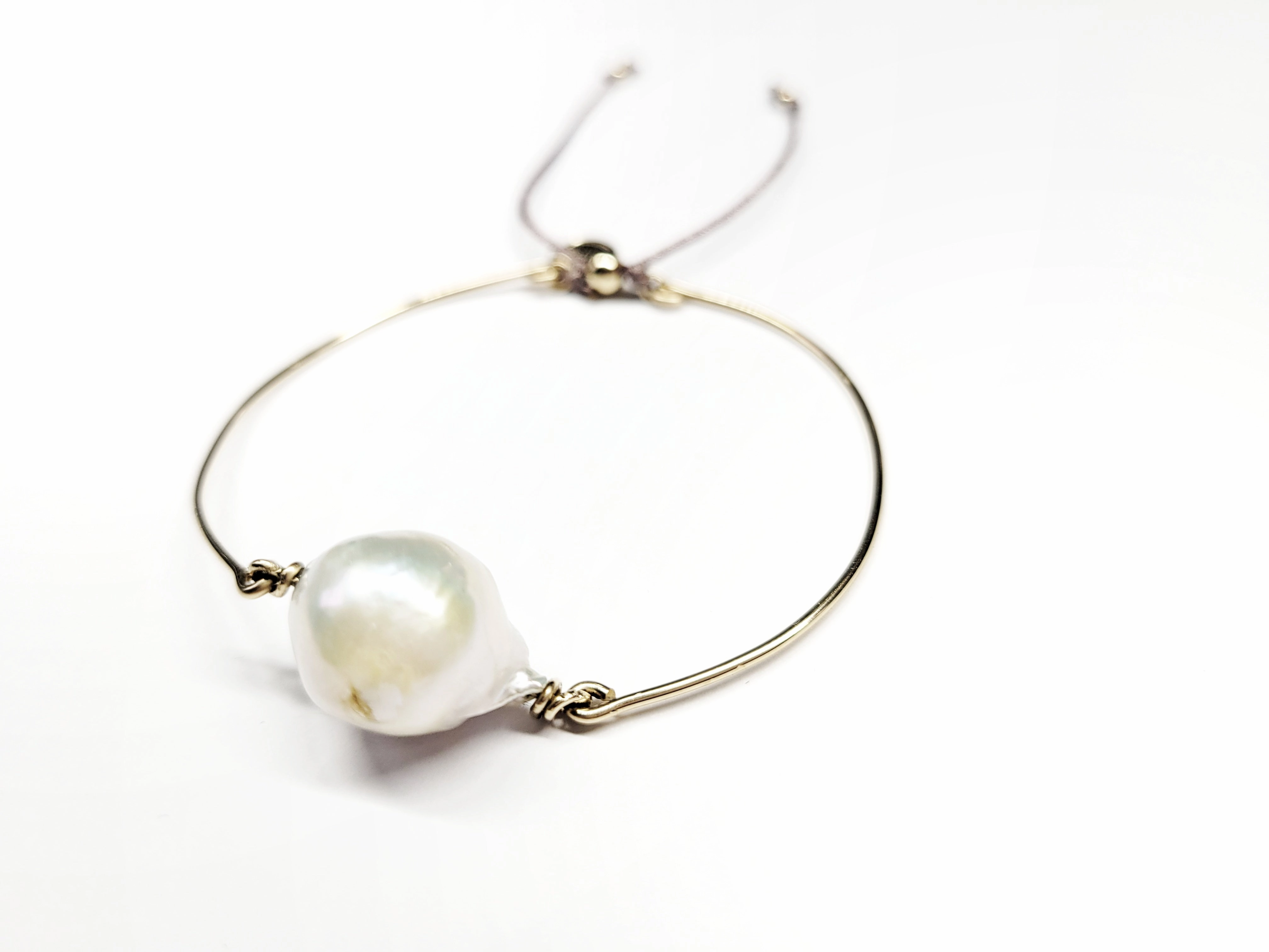 Baroque pearl bangle sliding ball