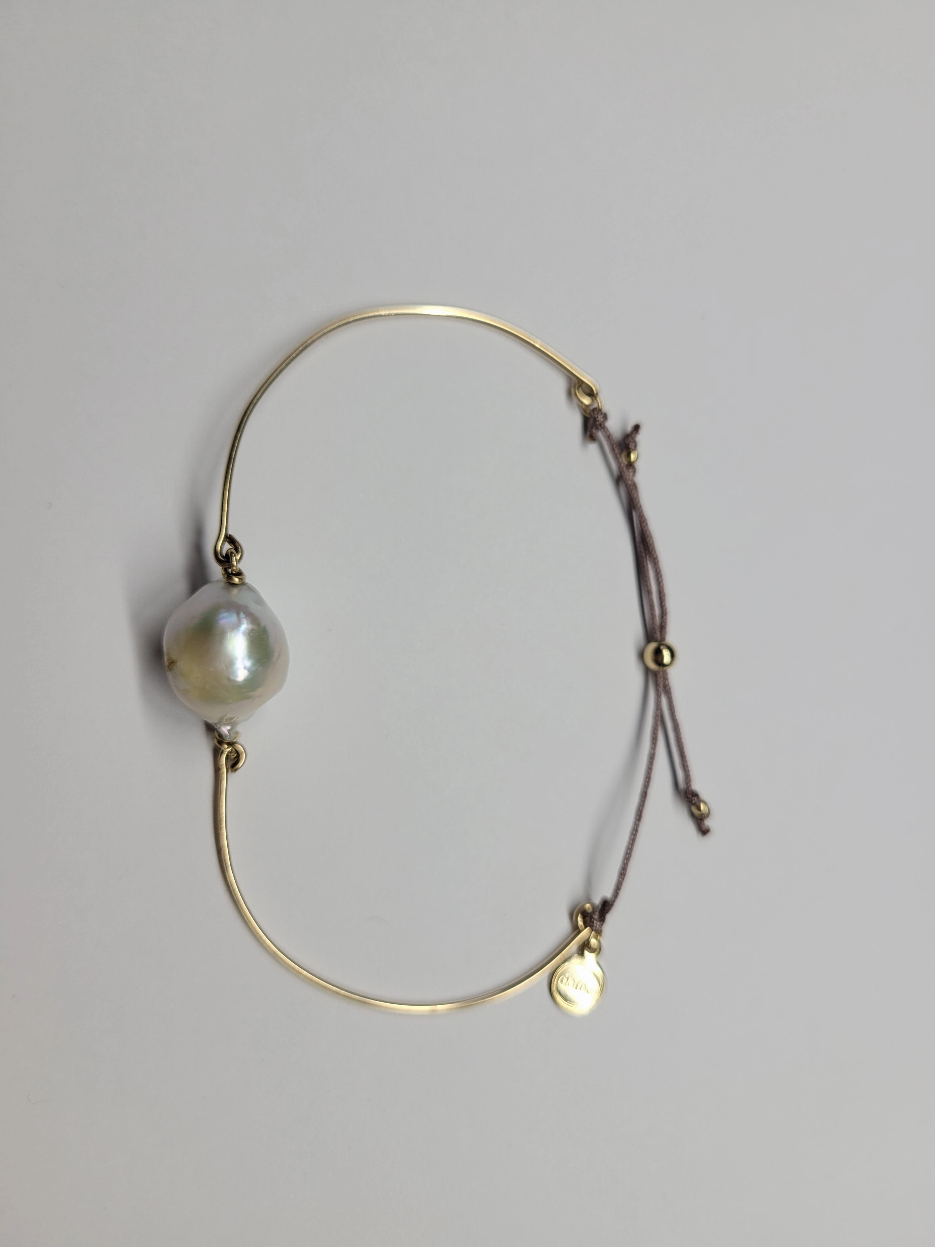 Baroque pearl bangle sliding ball