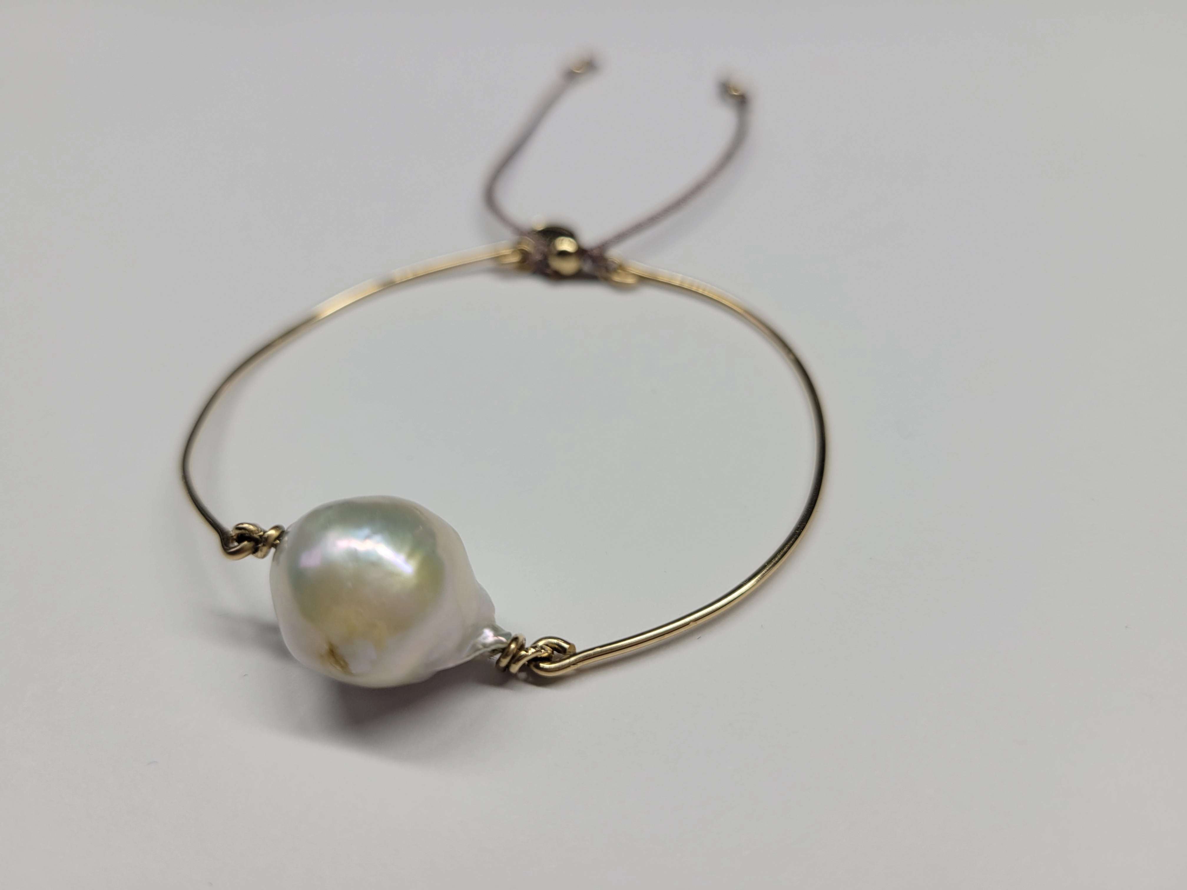 Baroque pearl bangle sliding ball