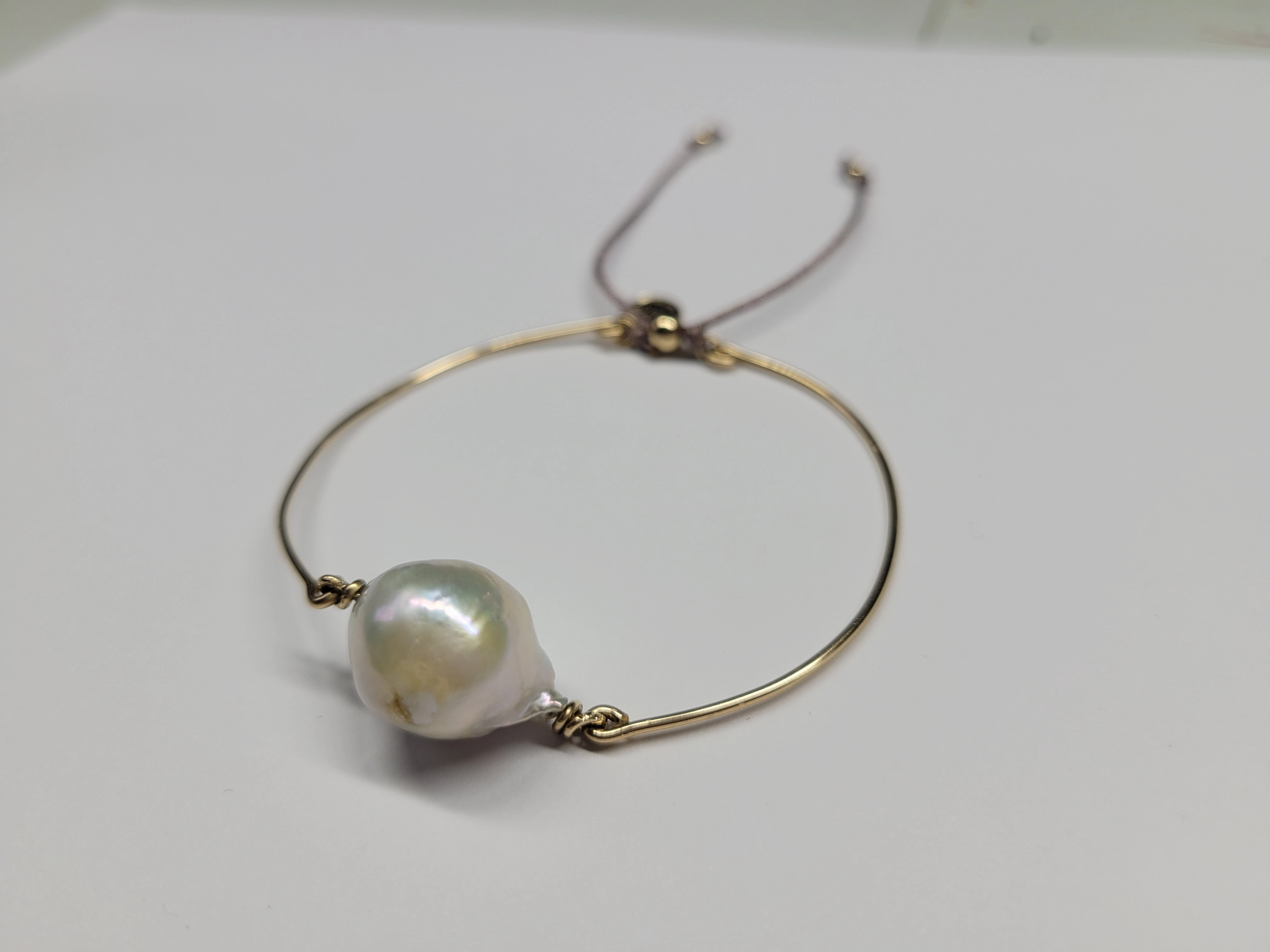 Baroque pearl bangle sliding ball